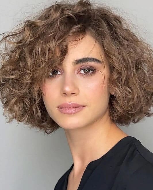 apple cut with curly hair