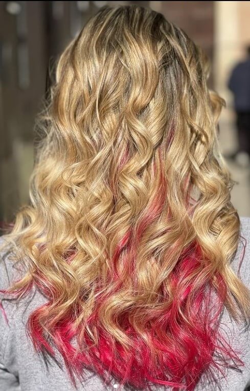 dark blonde hair with pink highlights
