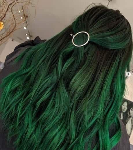 emerald green eyes and black hair