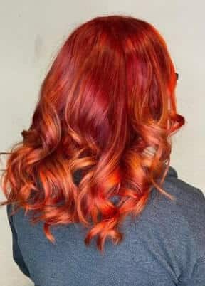 brown hair with red ombre highlights