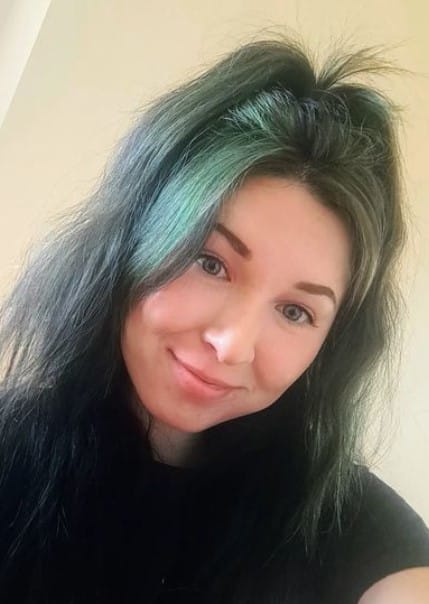 black hair with dark green underneath