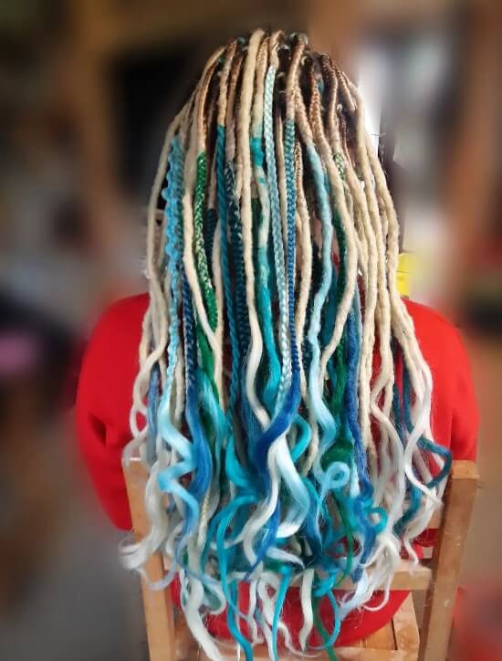 
blonde dreads with blue tips