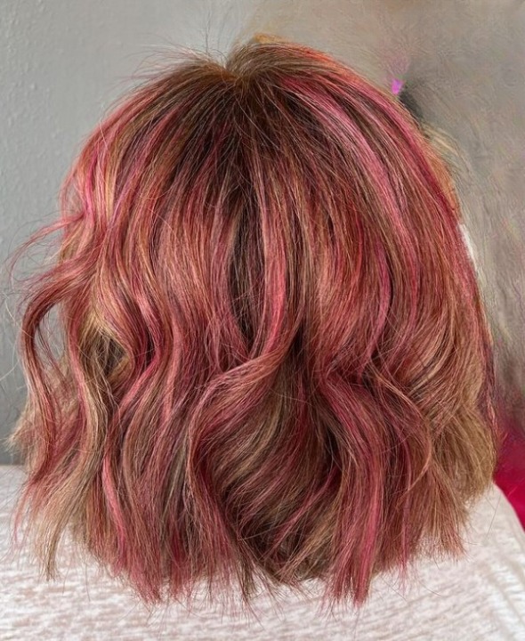 short brown hair with pink highlights