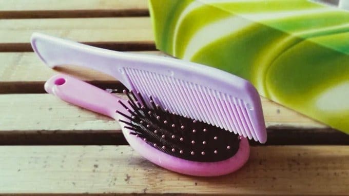 how to clean lint from hairbrush